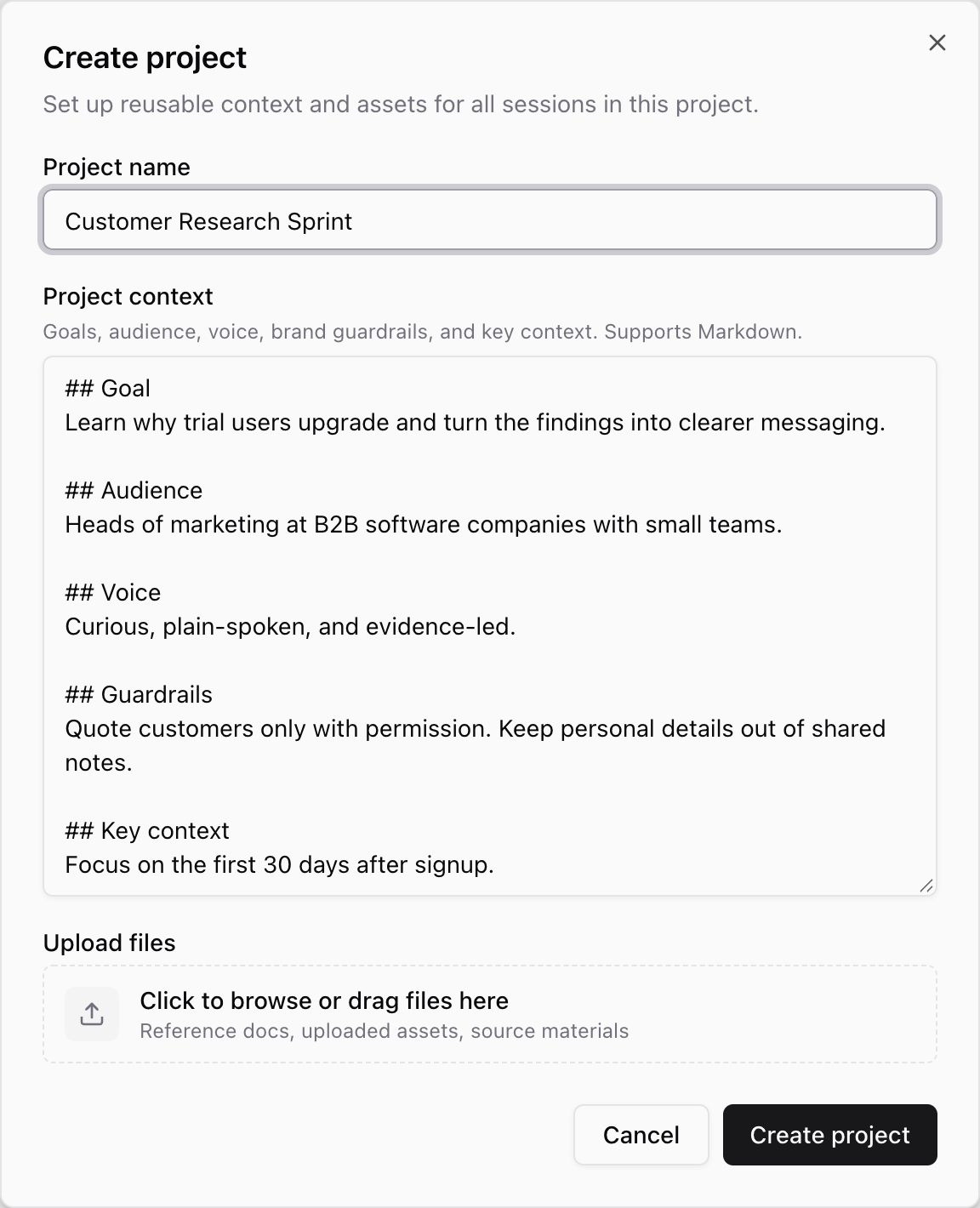 Create project dialog with Project name set to Customer Research Sprint, a Project context field filled with Markdown sections for goal, audience, voice, guardrails, and key context, an Upload files drop area, and Cancel and Create project buttons.